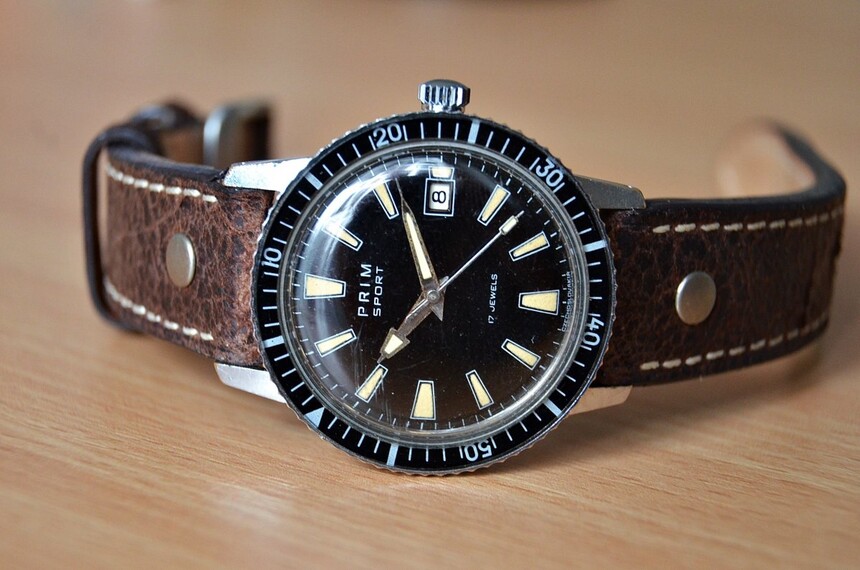 Hodinky PRIM Sport I. generácie (1968) - odolné hodinky testované na 6 ATM, zdroj: www.antik-hovorka.cz